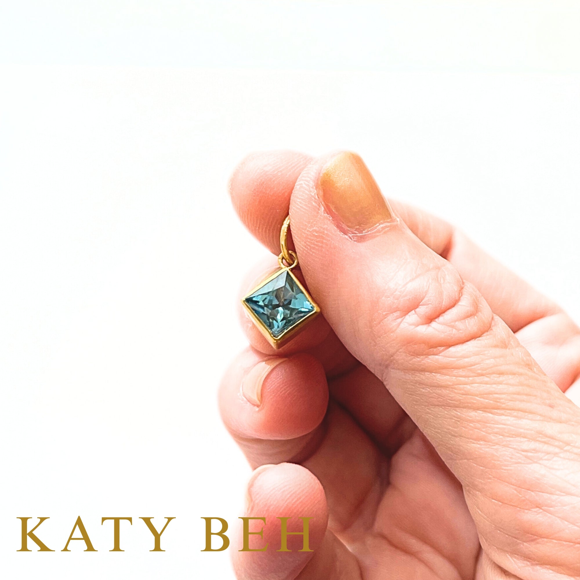 Wren Swiss Blue Topaz Pendant